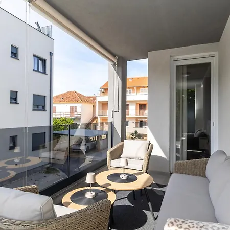 Pia By Belmont Realty *